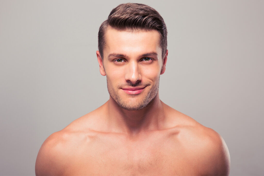 Confident man with smooth skin, potentially considering Botox for a youthful look.